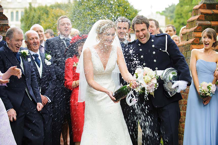 Bride and Groom Celebrating with a Champagne Shower